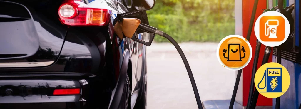 Conducteur qui fait le plein de carburant dans une station-service